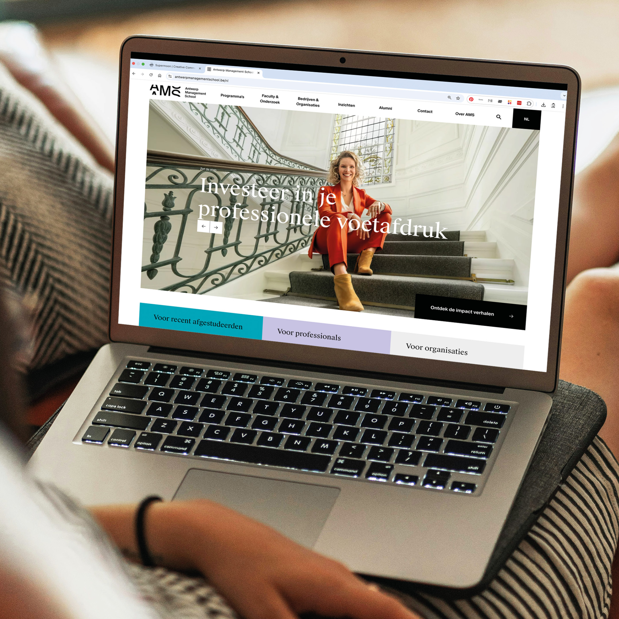 Antwerp Management School campaign website on a laptop
