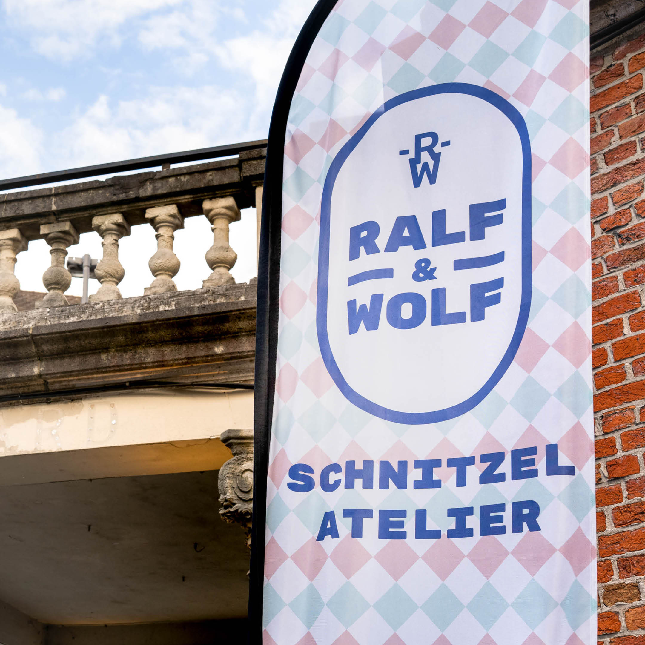 Ralf & Wolf schnitzel atelier flag