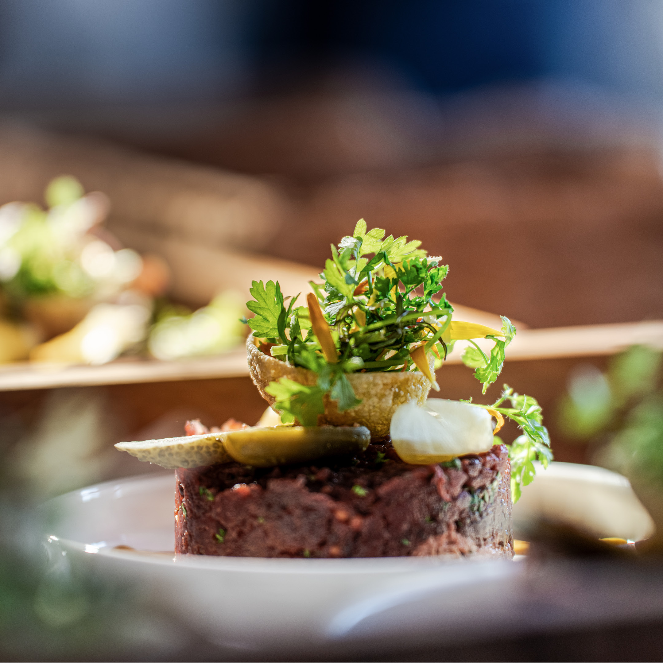 Plated dish from the &merlin event photography