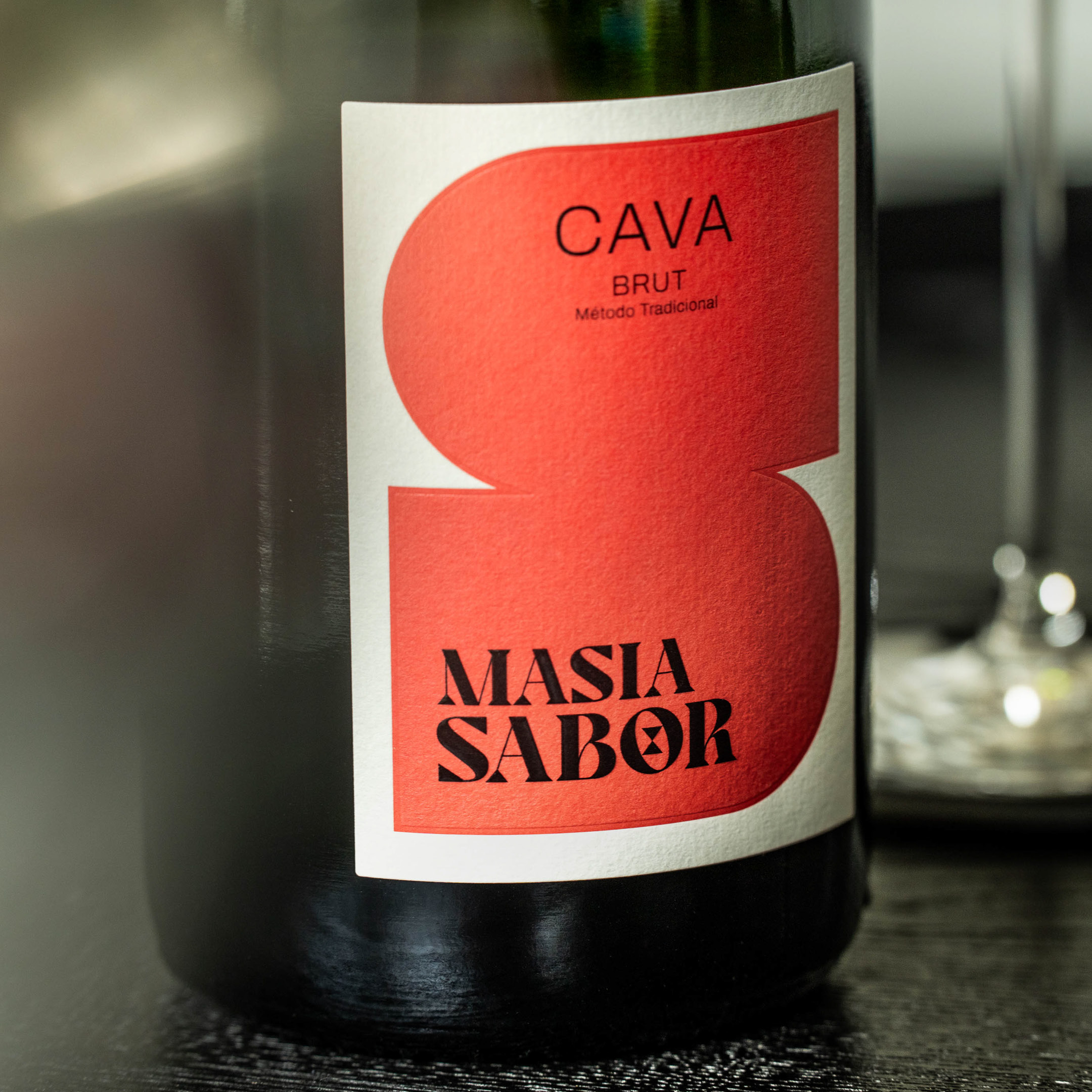 Masia Sabor Brut cava bottle with red label