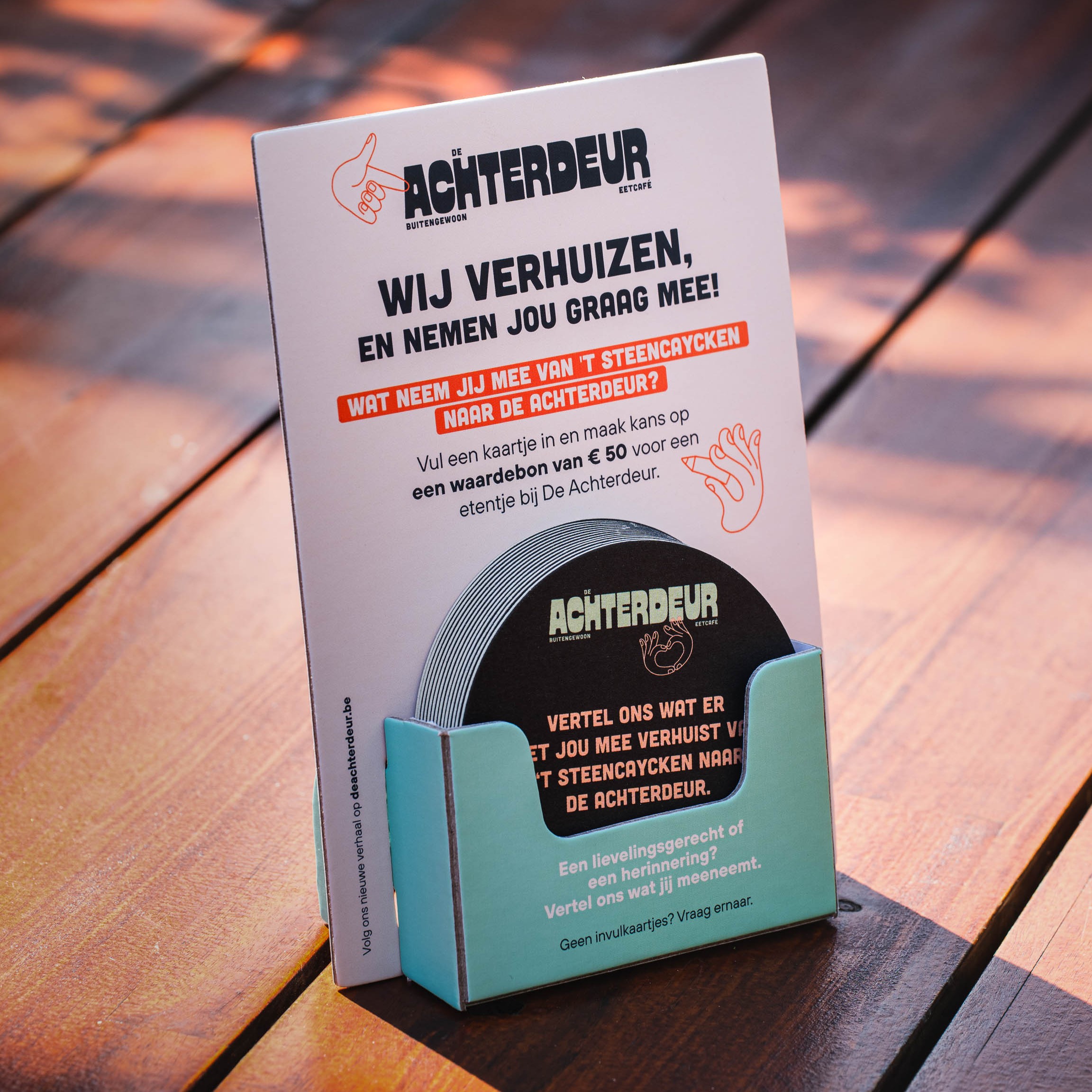 Teaser campaign flyer display for the opening of De Achterdeur